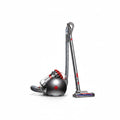 Cylindrical vacuum cleaner on a white background